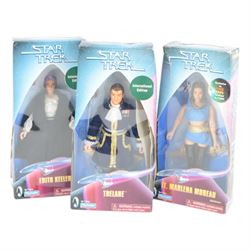 Three Playmates Star Trek figures, comprising LT Marlena Moreau, Edith Keller and Trelane, together with an Art Asylum Mirror Scotty action figure, all boxed