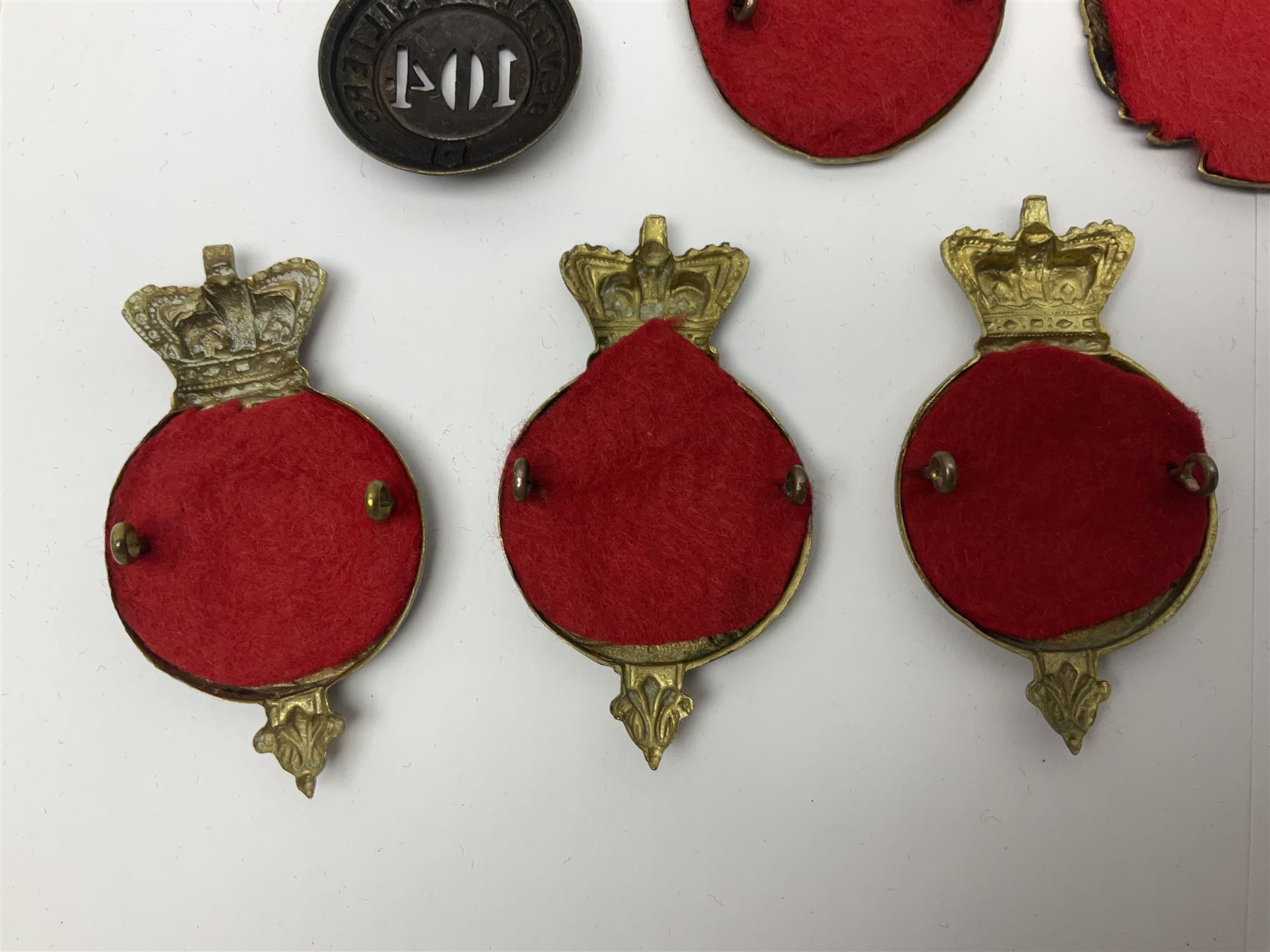 Ten cap badges of Indian interest comprising Bengal Fusiliers No.104, Bengal Infantry No.107, Royal Bengal Fusiliers No.101, Bombay Infantry No.109, Bombay L.I. No.106, two Royal Madras Fusiliers No.102, Madras Infantry No.108 and Madras L.I. No.105 (10)