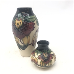  Two Moorcroft Anna Lily pattern vases, designed by Nicola Slaney H13.5cm & H6cm (2)  