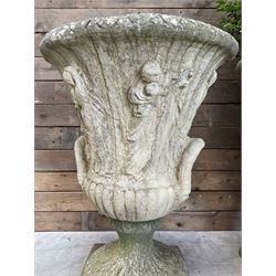 Set of four Victorian design cast stone Grecian urns, tapering form cast with figures and handles, square plinth bases
