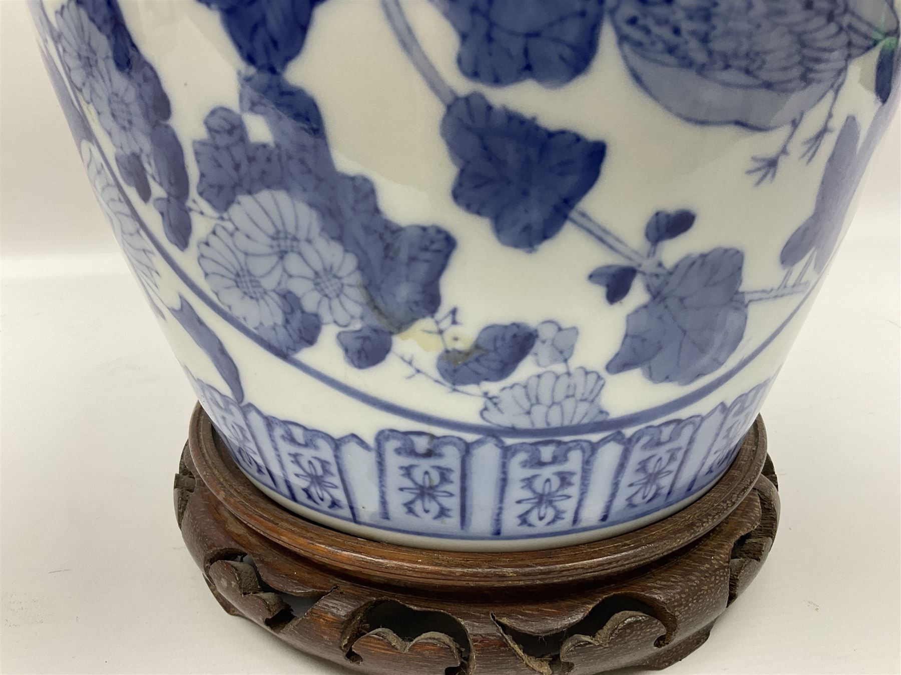 Chinese blue and white table lamp of baluster form, decorated with birds and floral displays, on hardwood base with shade, H78cm