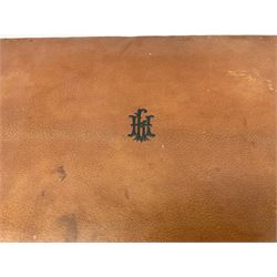 Vintage leather traveling case with monogram to cover, with watered silk lining to interior, and some contents, plus a further vintage travel case, (2)