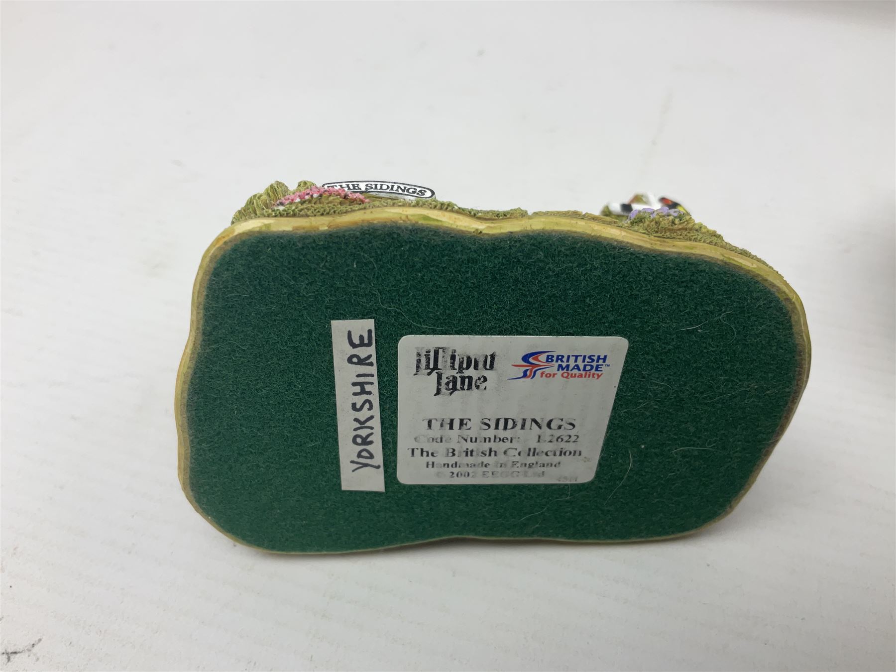 Eighteen Lilliput Lanes, including The Penny Farthing, The Pigsty, Borrowdale School, Fairy Cake Tearoom, An Apple a Day,Ladybird Cottage etc, all with original boxes 