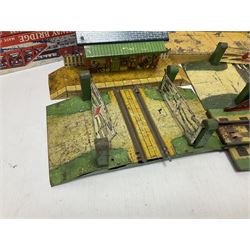 ‘0’ gauge - six boxed Hornby Hachette coaches comprising three Saloon Cars and three Dining Cars in original boxes; three loose ‘SNCF’ cars; three crossings, two Hornby/Meccano railway stations, one bridge and a water tank; two further Mettoy Railways ‘Railway Bridge’ in original boxes (17)