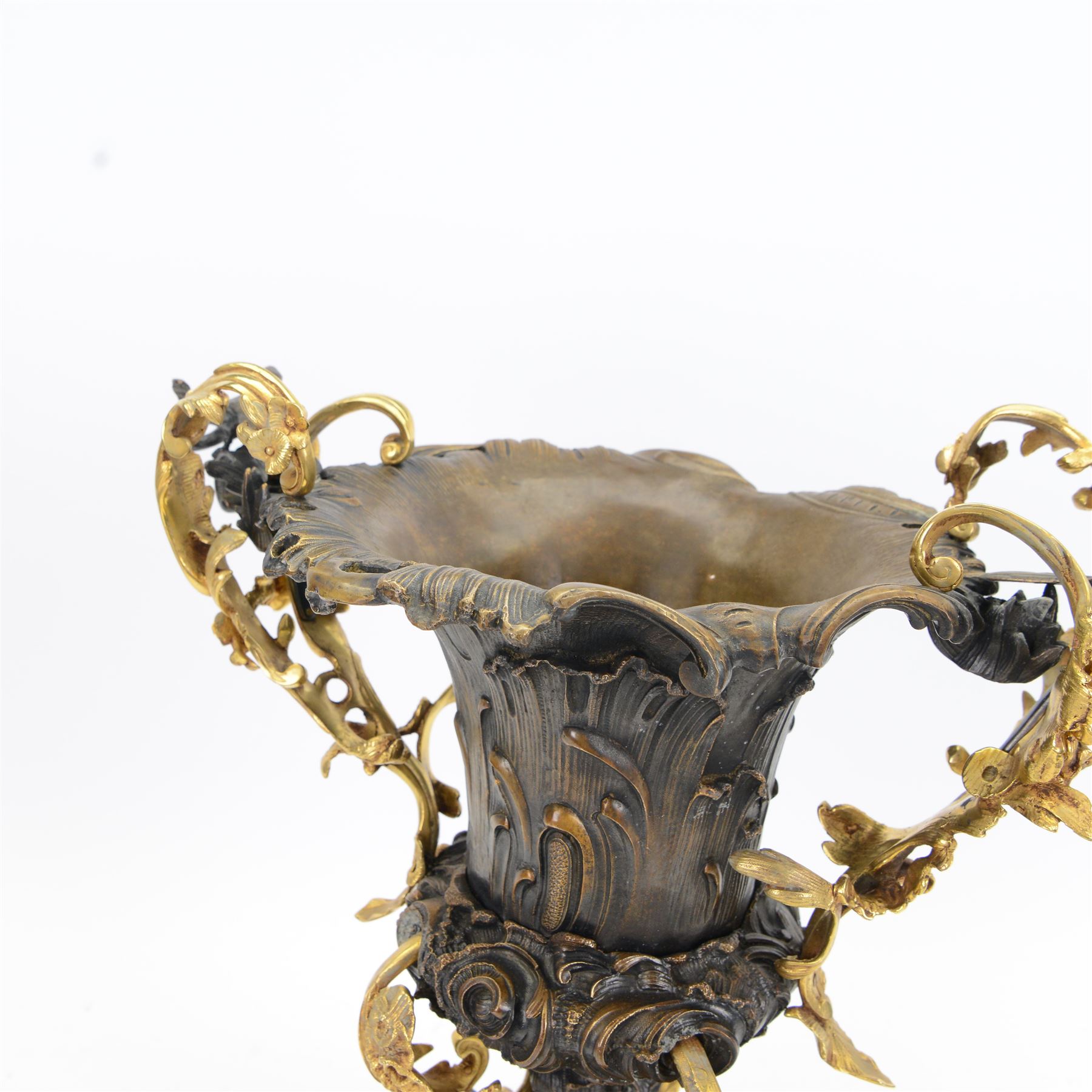After Henry Dasson (1825-1896): large French gilt bronze urn, the body of typical form and cast with C scrolls, with twin curved gilt foliate handles detailed with birds, upon a scrolling foot, and naturalistically cast base, impressed HENRY DASSON to foot, H50.5cm W48cm