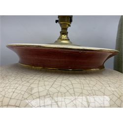 Large cream crackle glaze table lamp, together with a tall studio pottery vase in green with single loop handle, with impressed makers mark, H49cm