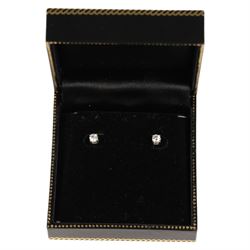 Pair of sliver diamond stud earrings, boxed