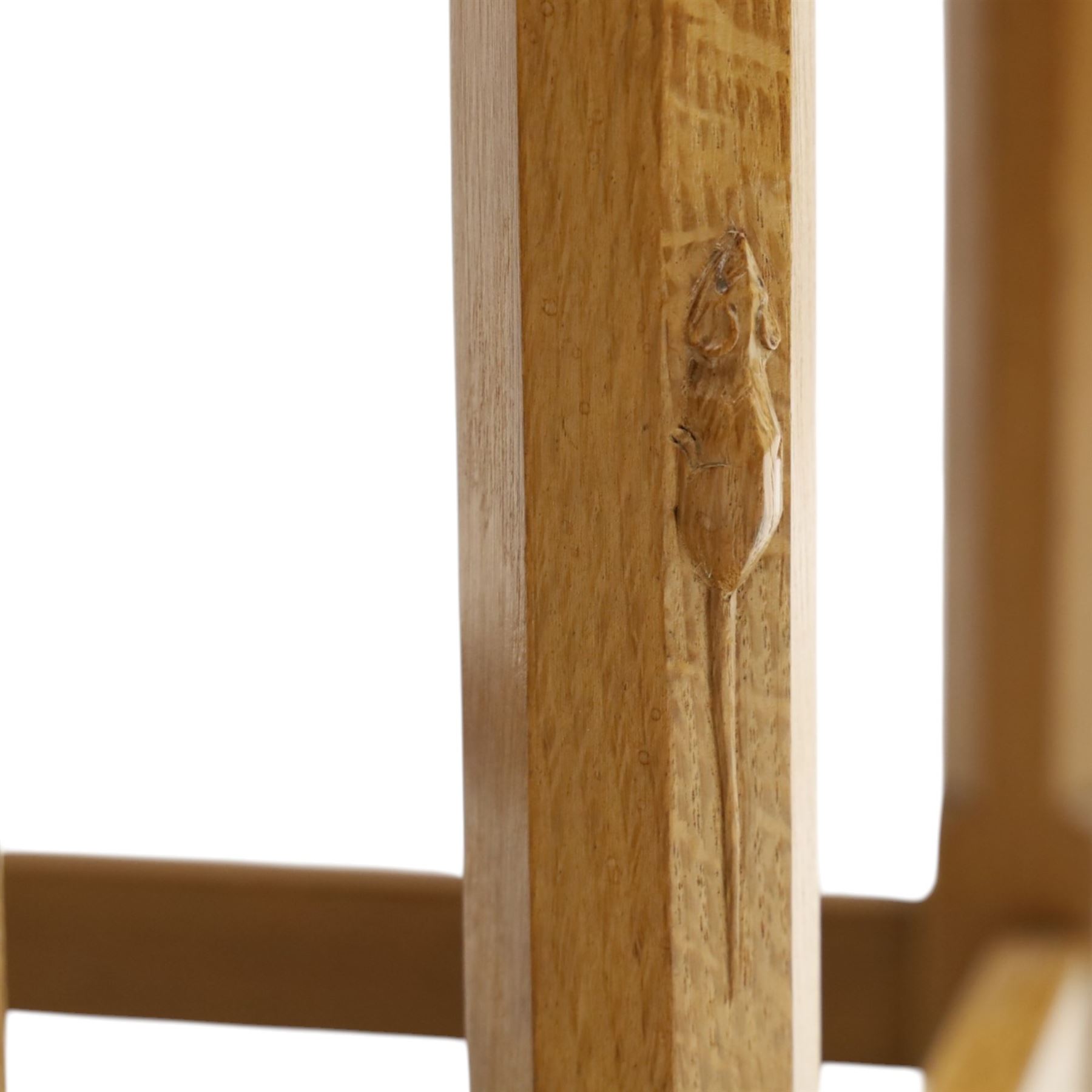 Mouseman - set of three adzed light oak nesting tables, each with rectangular top raised on octagonal legs joined by stretchers, with signature carved mouse, by the workshop of Robert Thompson, Kilburn