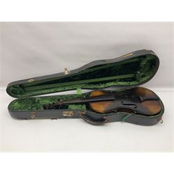 German violin c1890 with 36cm two-piece maple back and ribs and spruce top; bears label 'Antonius Stradivarius Cremona Faciebat Anno 1729' L59.5cm overall; in ebonised wooden 'coffin' case; and two German violins c1890 for completion - one bearing a Stradivarius label, the other a Ruggeri label; both in carrying cases (3)