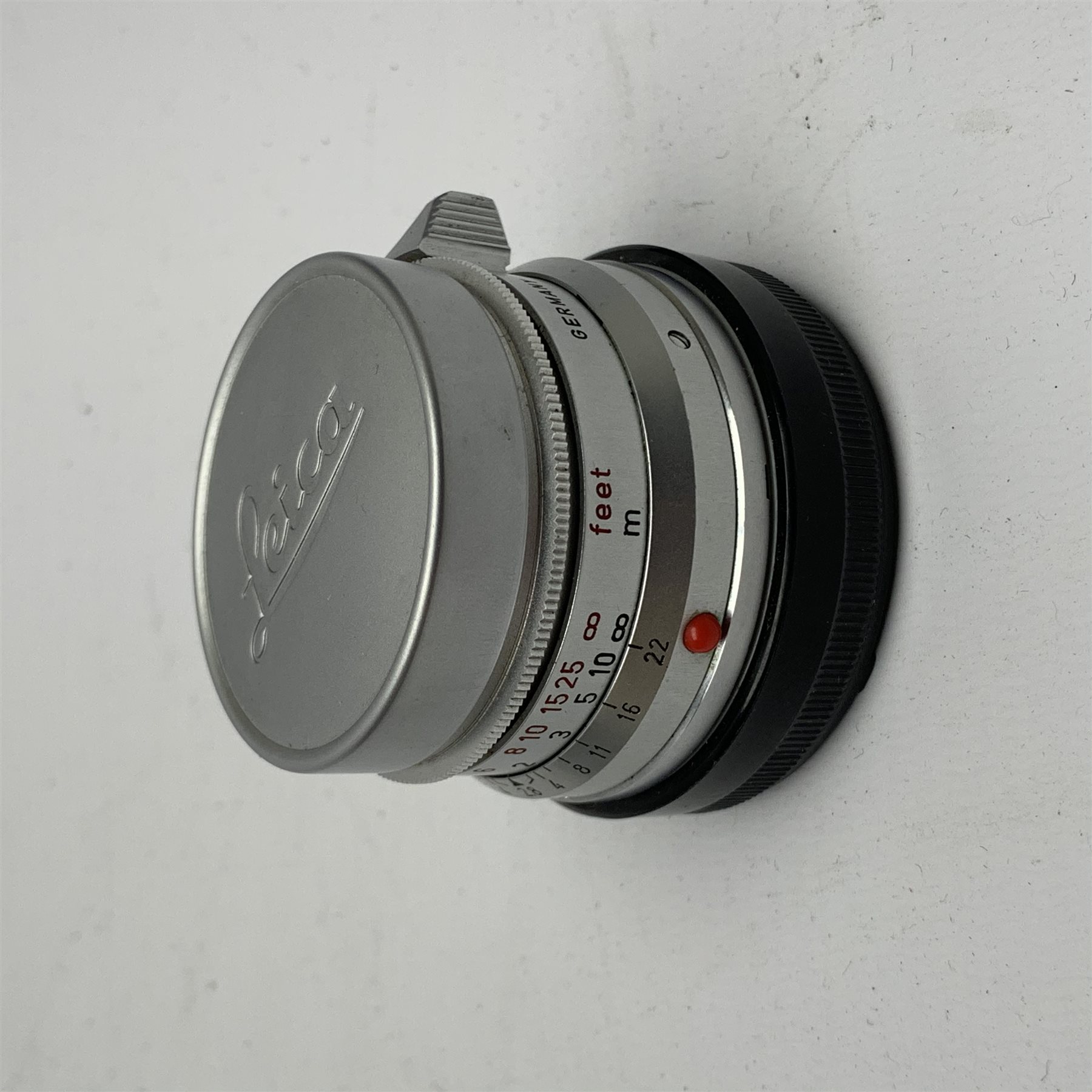 Leica M2-1013180 camera fitted with Leica Summicron 1:2/50 Leitz Wetzlar lens (1764800) and UVa filter, and Leica-Meter MR in leather case together with; Leica Elmarit 1:2.8/90 LW lens (1805634), Leica Summaron 1:28/35 LW lens (1782507), Leica M3 M2 adapter ring, Leica filters yellow and orange cased, three Leica lens hoods IUFOO, IROOA and 12585H (boxed), Leica pocket book, guide and 1960s survey catalogue & price guide leaflet, with original M2 camera box