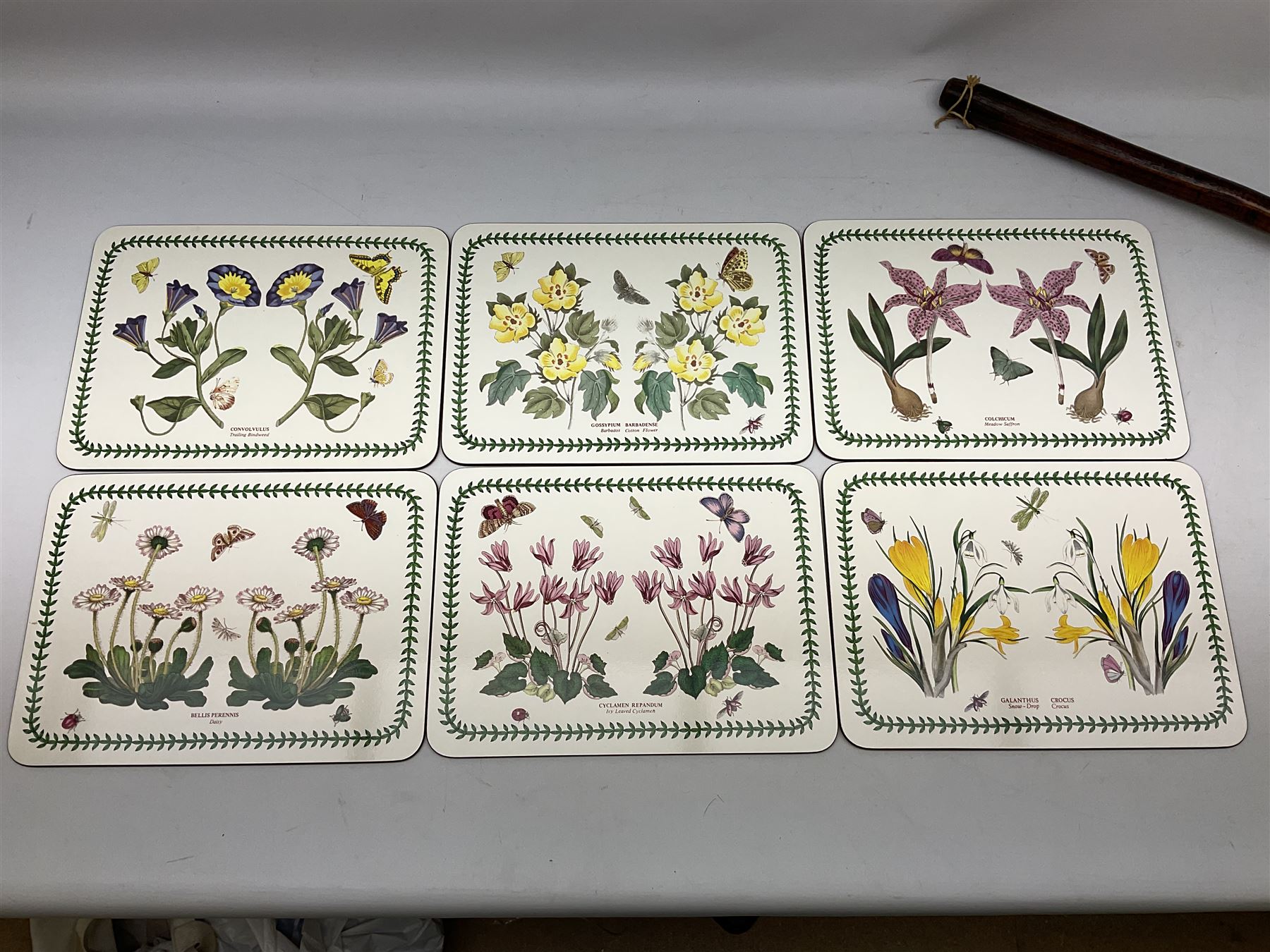 Copper bed pan, Portmeirion placemats, glazed and framed needlework and George Houghton cartoons placemats