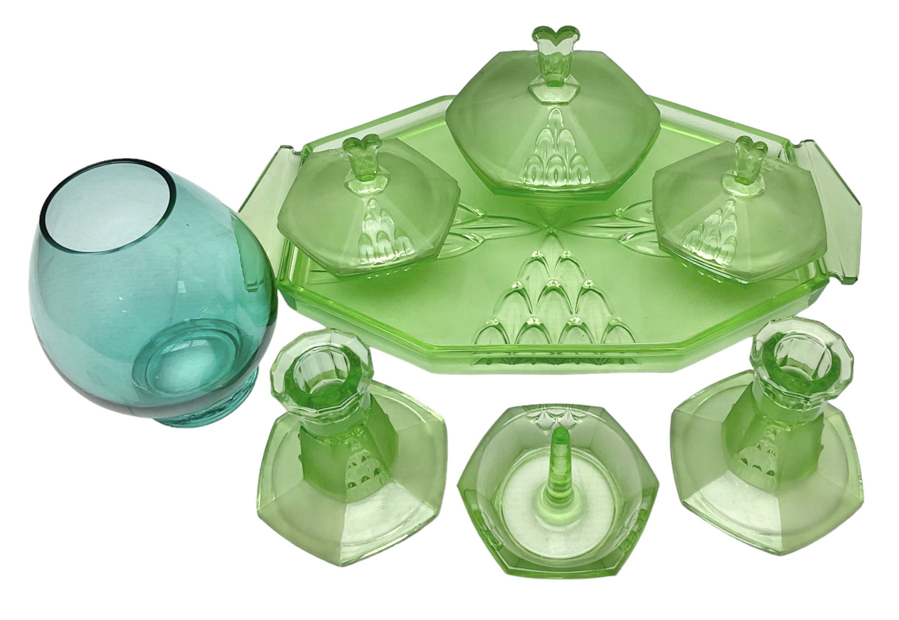 Czech uranium glass dressing table set, comprising twin handled tray, pair of candlesticks, three lidded jars and ring holder dish, and a blue Finnish Riihimäki glass, tray L35cm