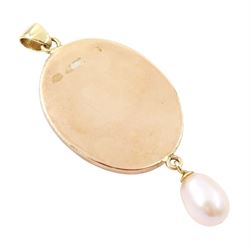 18th/ 19th century portrait pendant, set with an oval miniature of a woman wearing a blue dress on ivory, suspending a pearl drop. 
This lot has been registered for sale under Section 10 of the APHA Ivory Act
