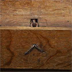 18th century carved oak coffer, rectangular hinged top over a lunette-carved frieze and tracery-style carved triple panelled front, the lower rail carved with repeating anthemion motifs, on square feet