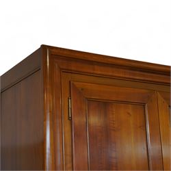 Brigitte Forestier - French cherry wood four door wardrobe unit, fitted with hanging and shelving