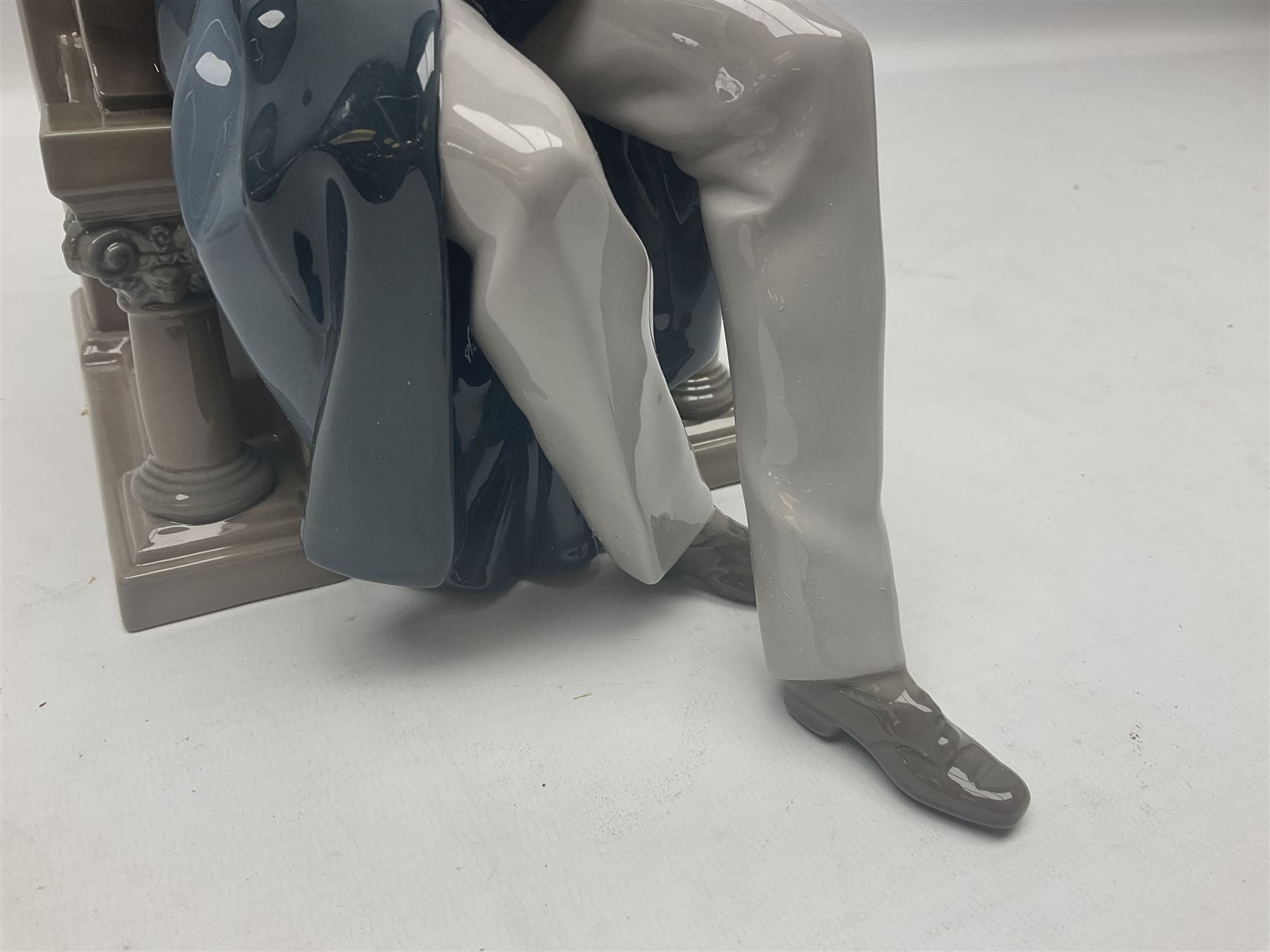 Lladro figure, Justice, modelled as a judge sat in a char, sculpted by Salvador Furió, with original box, no 5489, year issued 1988, year retired 1993, H34cm 