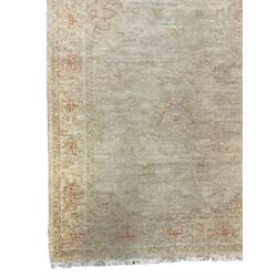 Persian Zeigler runner, ivory ground decorated with faint floral design 