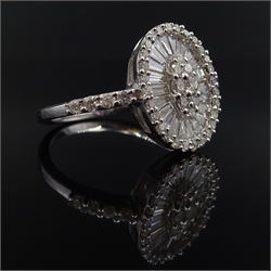  White gold diamond and baguette diamond mirror cluster ring, with diamond set shoulders, stamped 18K  