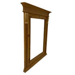 Pine framed architectural wall mirror with bevelled glass