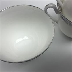 Royal Worcester Beaufort tea service, comprising teapot, milk jug, open saucier, eleven teacups, twelve saucers, eight dessert plates and one cake plate