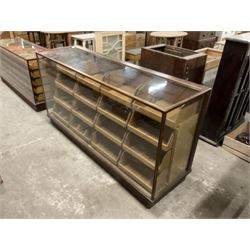 20th century oak and glazed haberdashery shop’s cabinet, glass front and sides, fitted with sixteen graduating drawers  - THIS LOT IS TO BE COLLECTED BY APPOINTMENT FROM THE OLD BUFFER DEPOT, MELBOURNE PLACE, SOWERBY, THIRSK, YO7 1QY