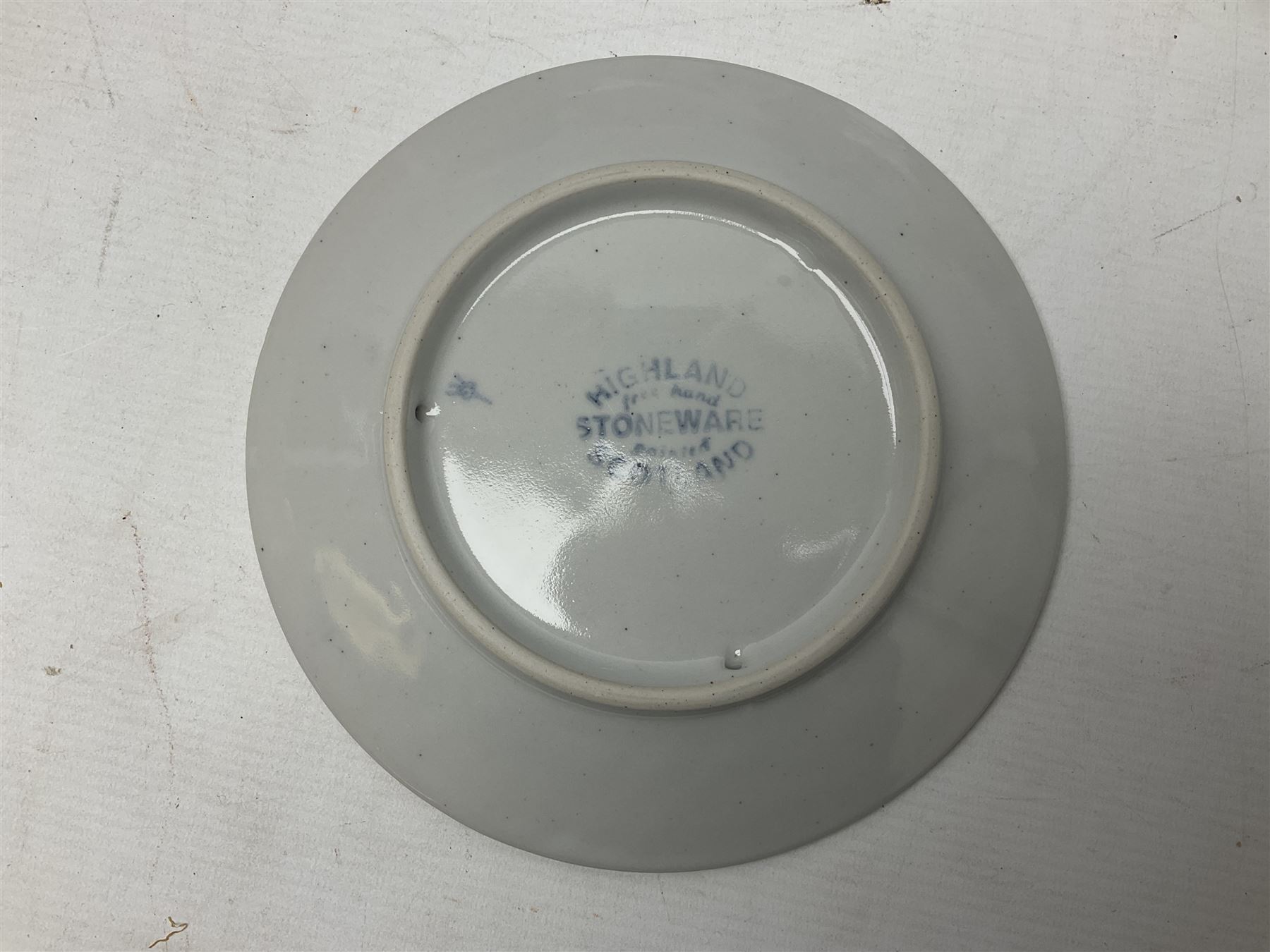 Highland Stoneware Scotland, decorated with landscapes and seascapes, comprising of two bowls, plate and two covered trinket boxes 