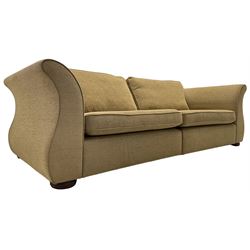 Contemporary large three-seat sofa upholstered in light brown textured fabric, on turned compressed feet, upholstered by Plumbs 
