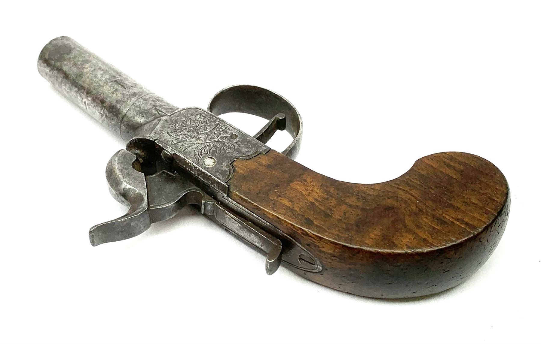 19th century English percussion box lock pocket pistol by Booth Huddersfield with (seized) turn-off barrel, engraved lock, walnut stock and thumb safety L16cm overall