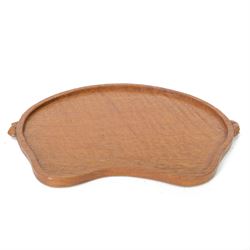 Mouseman - adzed oak tea tray, of kidney form with two carved mouse signatures forming the...