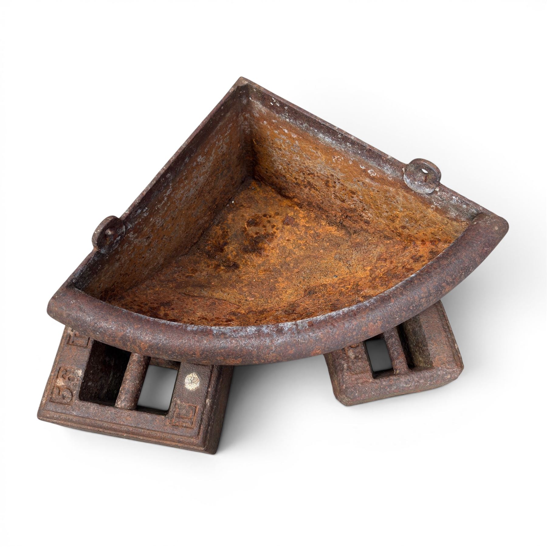  Cast iron corner manger along with one 56lb cast iron weight and another of unknown weight