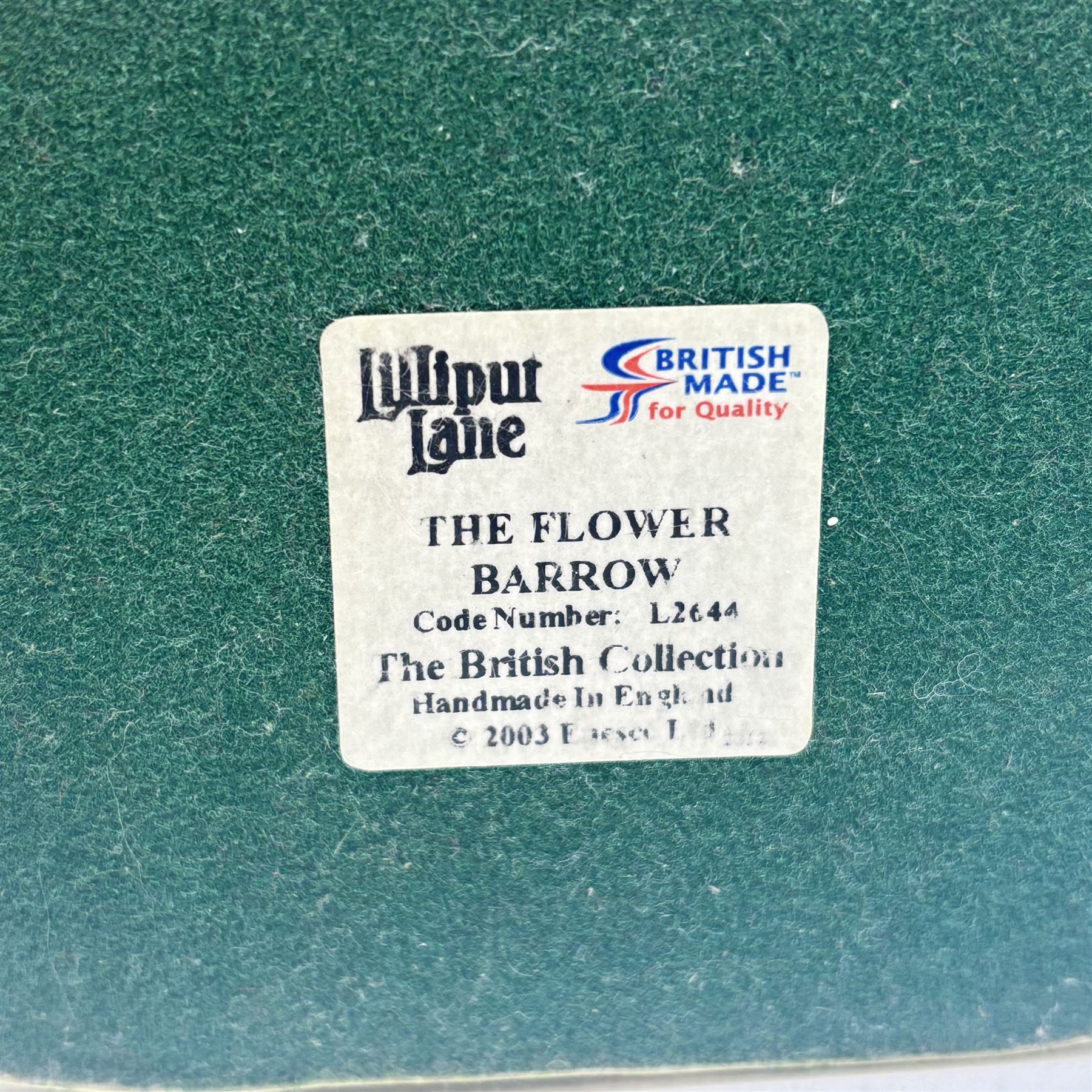 Eighteen Lilliput lanes, including Lundy Lighthouse, Bluebell Wood, St Marys, Winsor Cottage etc, all with original boxes and four limited edition Lilliput Lane prints 