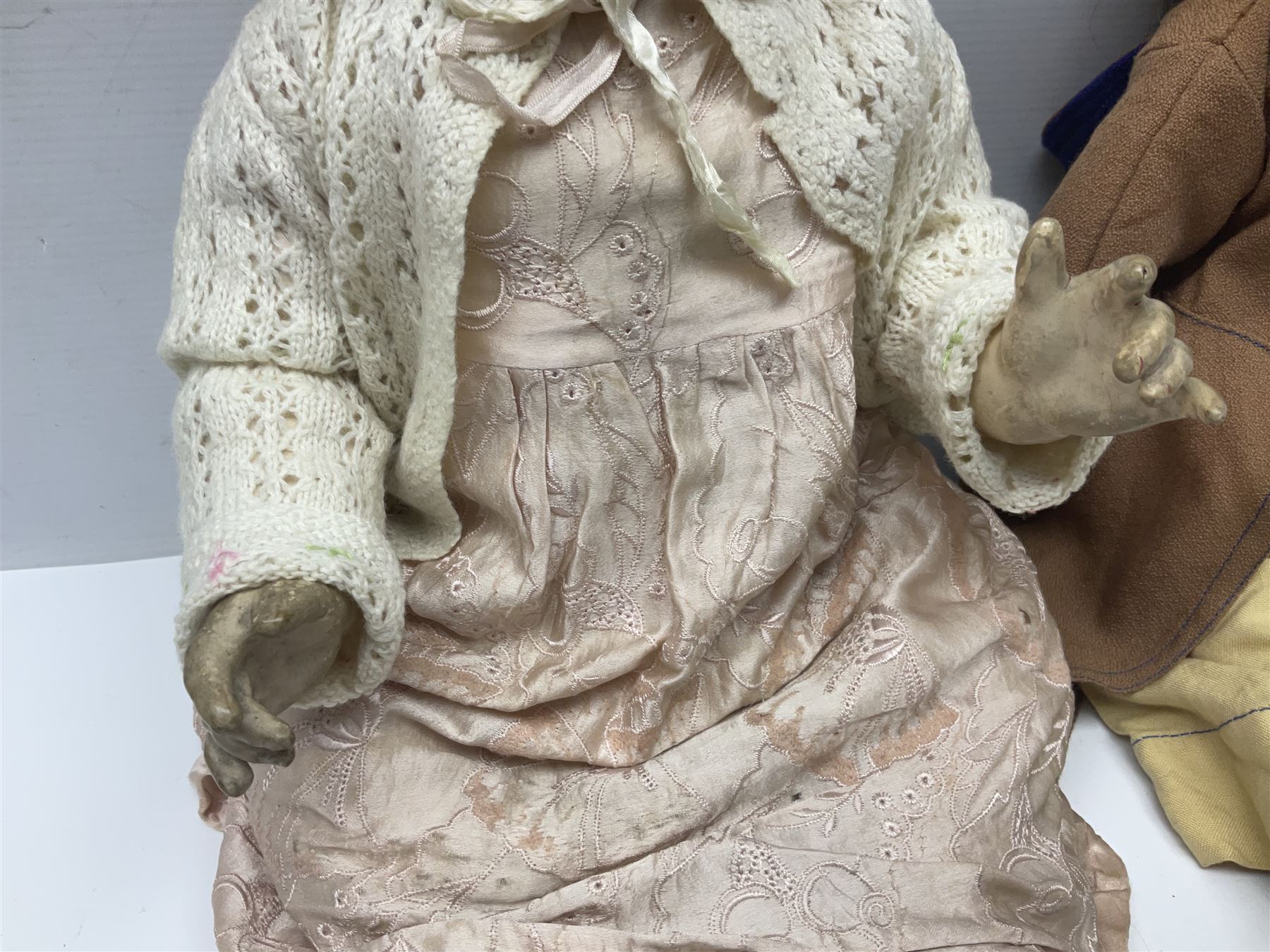 Catterfelder Puppenfabrik Germany bisque head baby doll with moulded hair, sleeping eyes, open mouth with teeth and trembly tongue, and composition body with jointed limbs; marked 'C.P. 208/50 V S' H50cm; together with an Armand Marseille bisque head doll with applied hair, sleeping eyes, open mouth with teeth and composition body with jointed limbs; marked 'Made in Germany Armand Marseille 390n D.R.G.M. 246/1 A. 6 M.' H56cm (2)