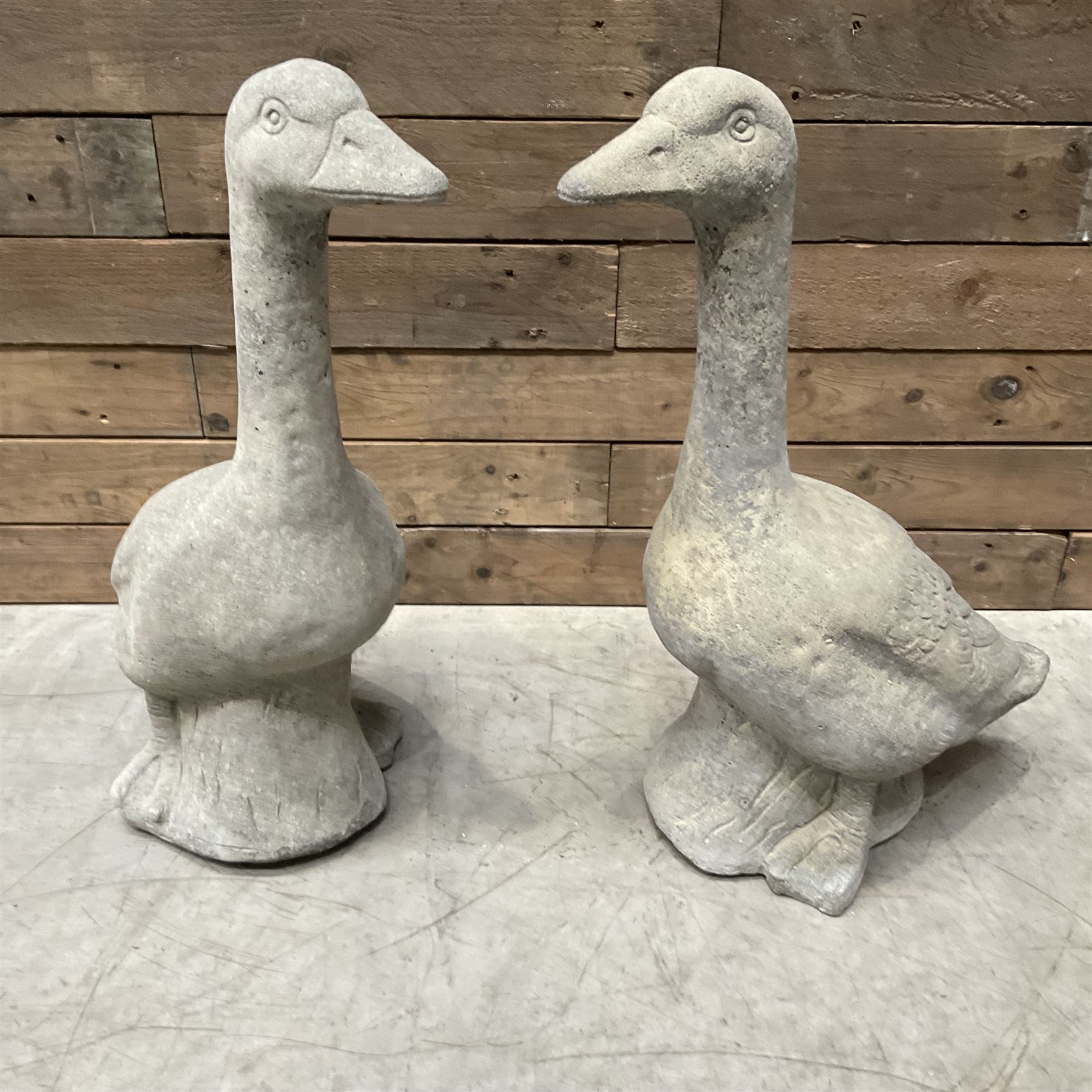 Pair of cast stone garden geese