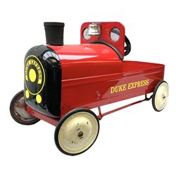 Mid 20th century 'The Duke Express’ child’s pedal car, the steel body in the form of a train painted red with black rubber chimney, chrome bell, yellow decals, white wheels and rubber tyres, the interior with steering wheel and pedals, L70cm