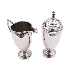 1930's silver sugar sifter and cream jug, each of plain tapering form upon a circular stepped foot, hallmarked James Carr, Birmingham 1938, sugar sifter H14.5cm, 6.47 ozt (201.3 grams)