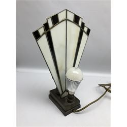 Art Deco style table lamp, modelled in the form of a bronzed female figure before a leaded glass fan shaped shade, H38cm