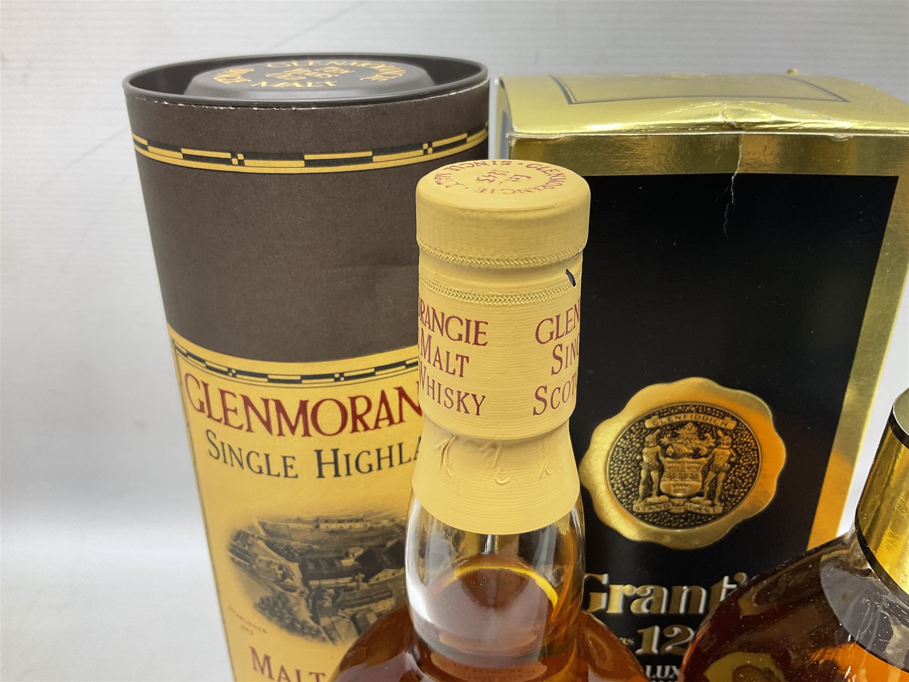 Glenmorangie, ten year old Scotch whisky, 1 litre 43% vol, Grant's twelve year old Scotch whisky 1 litre, 43 G.L and Johnnie Walker Black Label, twelve year old Scotch whisky, 1 litre 43% vol, all boxed (3)