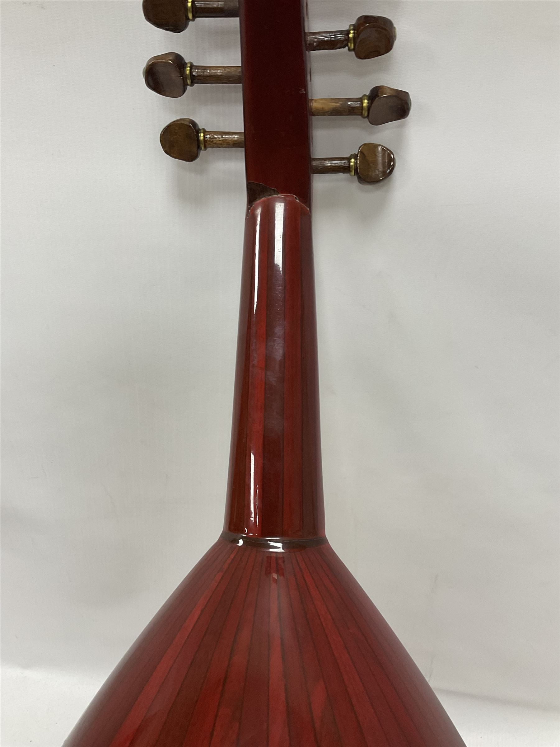 20th century Middle Eastern six string lute with a segmented back and a purpose designed hardwood stand