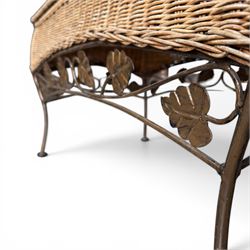 Basket work coffee table featuring scrolling leaf edging on tapered lags
