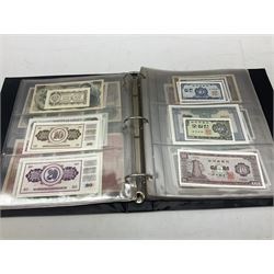 World banknotes, including Queen Elizabeth II The States of Jersey one pound 'DB202703', five pounds 'BB527762' and ten pounds 'AB651481', reserve bank of New Zealand two dollars '1L3 741894', King George V Straits Settlements one dollar 1st January 1935 'F/83 28924', various Bank of England notes etc, housed in two ring binder albums