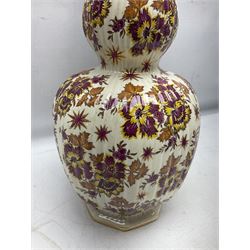 Mid 20th century Boch Freres of Belgium Keralux Fleur De Saxe vase, of double gourd form with pink and yellow flowers amongst orange foliage and gilt decoration, H44cm