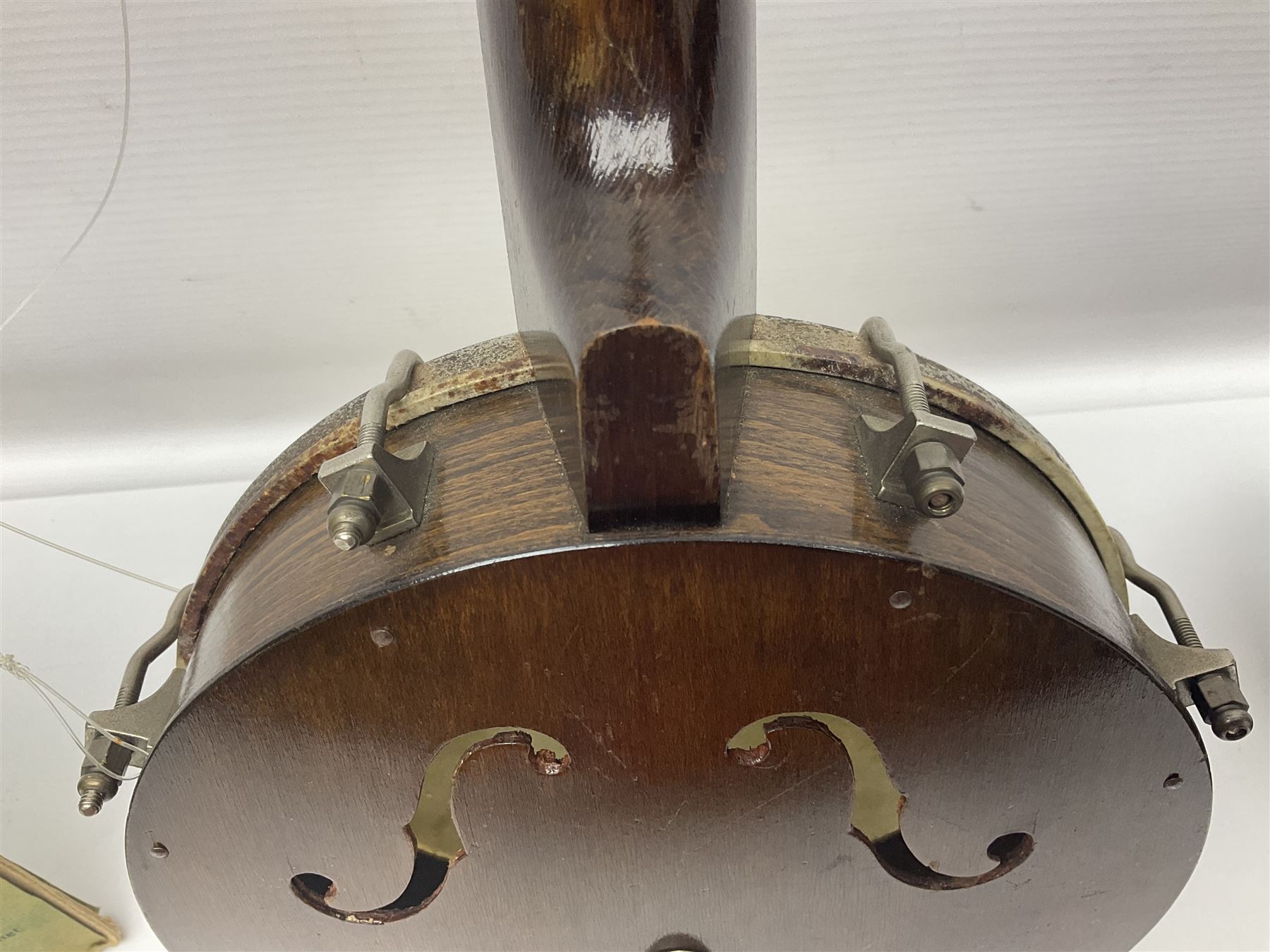 George Formby banjolele with metal plaque to headstock L55cm; in carrying case with instruction booklet.