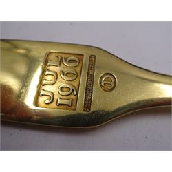 Six Danish silver and silver-gilt year spoons, including four example by Anton Michelsen, each with enamel decoration, including Christmas and other religious designs, dated between 1936 and 1984, each with maker's stamps to underside, together with two silver-gilt examples by Georg Jensen, each with enamel flowers to finials, dated 1975 and 1976, with maker's mark and Sterling Denmark stamped to underside 