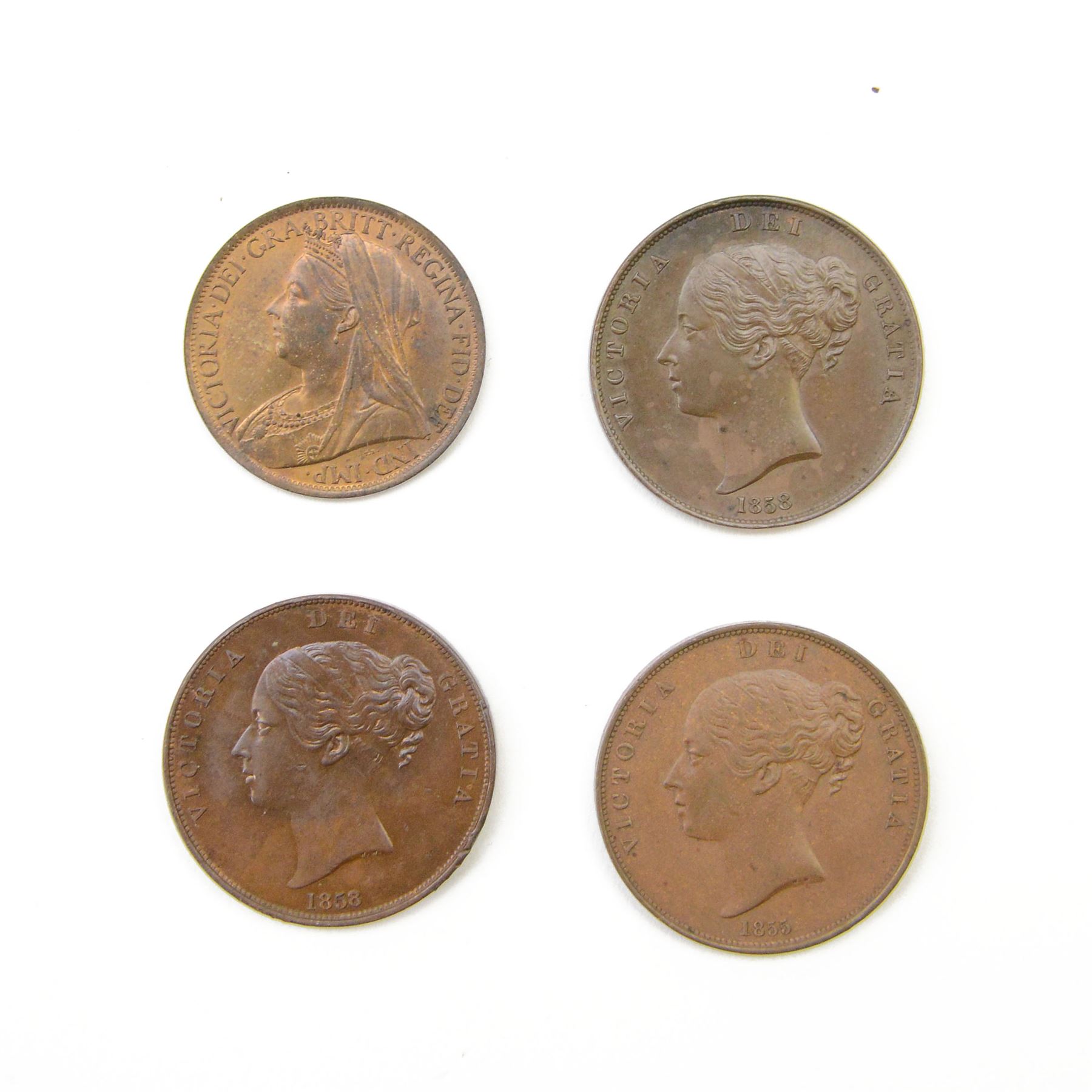 Four Queen Victoria one penny coins, dated 1855, two 1858 and 1899