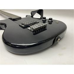 Encore black electric cut-away guitar L96cm; and Spanish Victor Garcia model 187 acoustic guitar, bears label dated 1972 L99cm; each in soft carrying case (2)