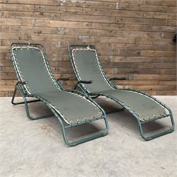 Pair metal framed folding sun loungers