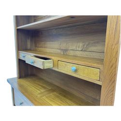 Manor Oak - light oak dresser and rack, fitted with two shelves with three drawers, two deep drawers and pot baked base with basket storage