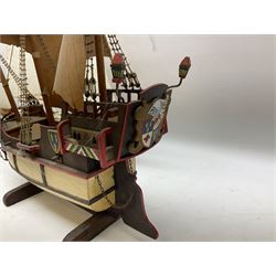 Wooden model of a schooner together with another similar example, largest example 48cm