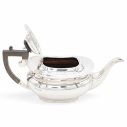 1920s silver tea pot, of oval bellied form, with Bakelite type handle and finial, hallmarked C W Fletcher & Son Ltd, Sheffield 1923, H15cm