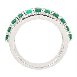 Platinum three row emerald and diamond half eternity ring, eleven oval cut emeralds with a row of round brilliant cut diamonds either side, hallmarked, total emerald weight approx 2.50 carat, total diamond weight approx 0.45 carat